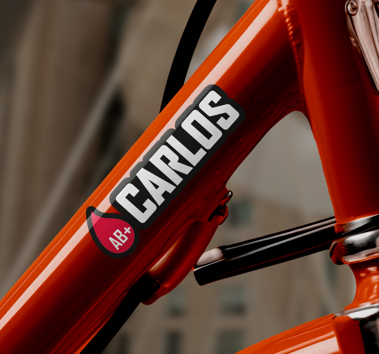 Vinilo bicicleta bandera con nombre tipo de sangre - TenVinilo