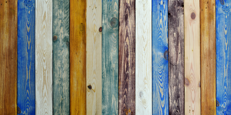 Alfombra vinílica tablones de madera de colores - TenVinilo